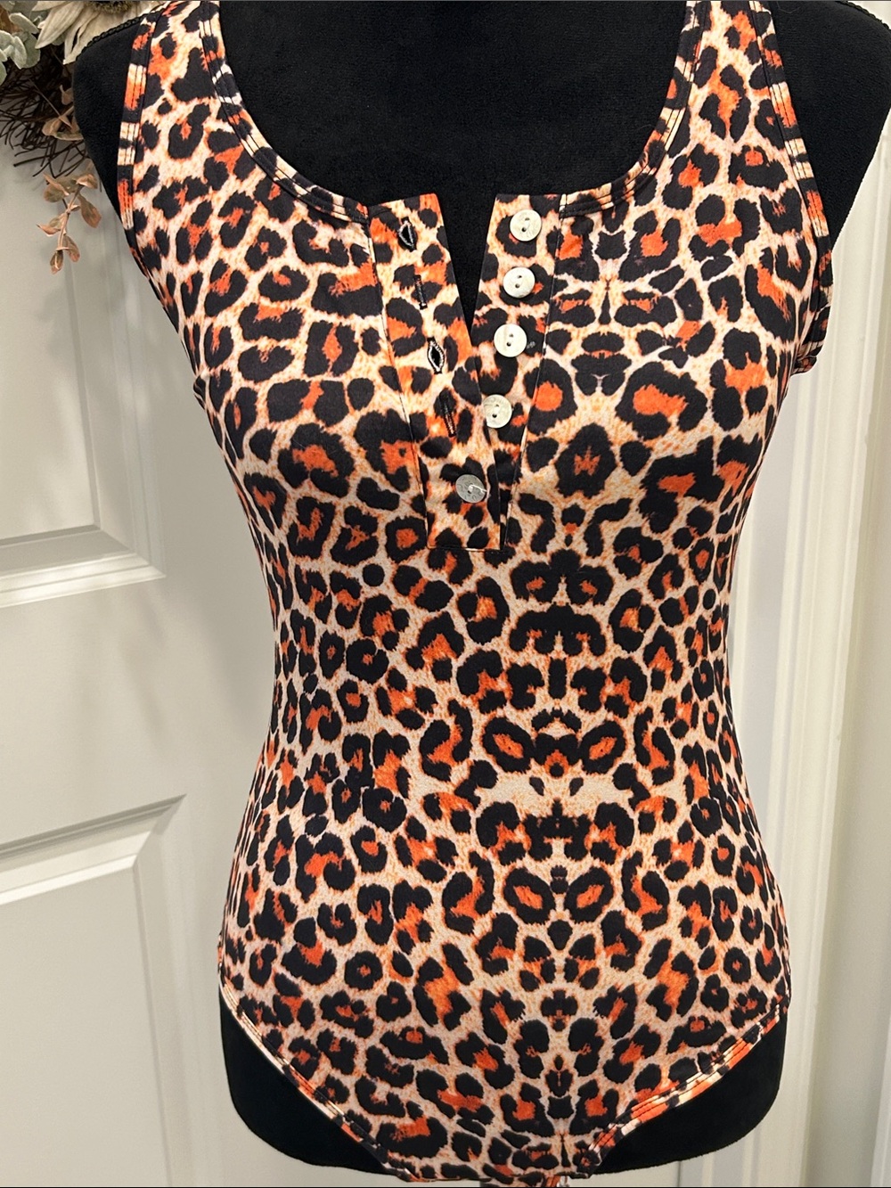 ReoRia NWT Orange and Black Leopard Print Bodysuit Size Small